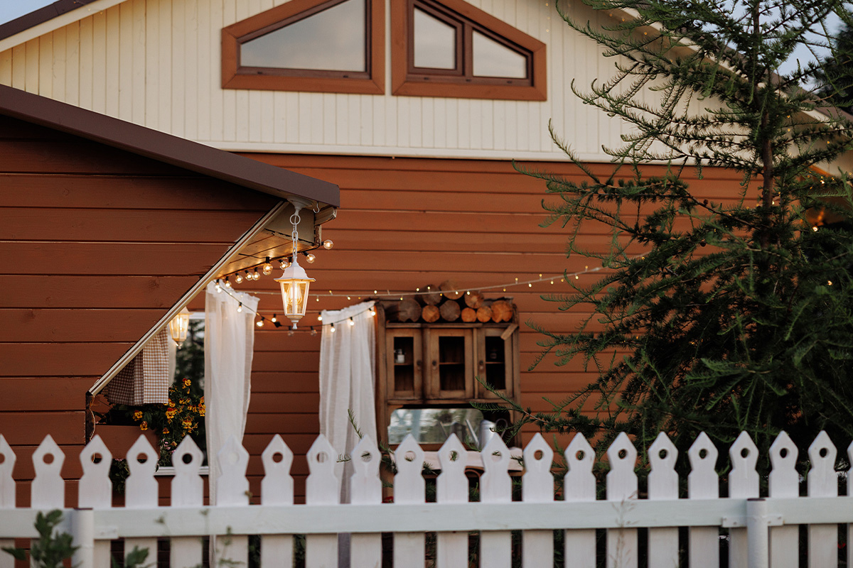 Wichita Home Backyard With Wood Siding