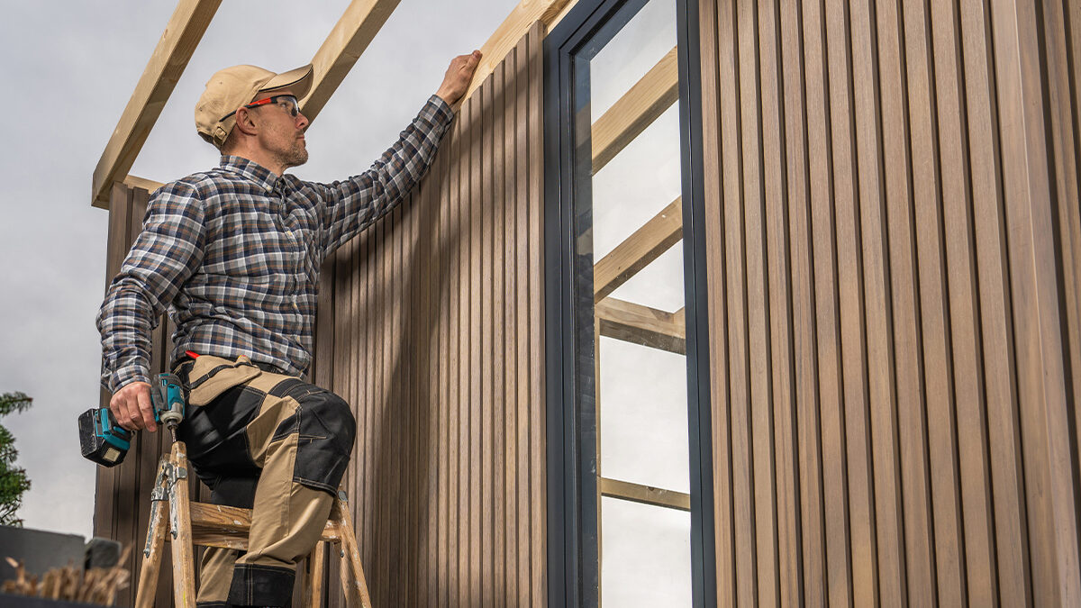 Contractor Installing Popular Siding Materials On Wichita Ks Home