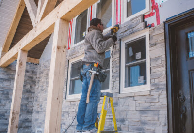 Man Installing Best Replacement Windows In Wichita Ks